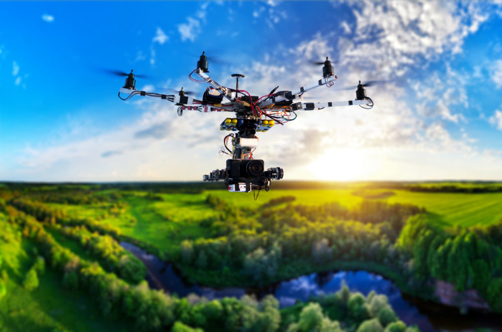 Flying commercial drones to monitor landfills.