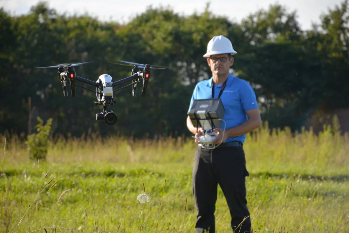 Instructor Alex flying a drone